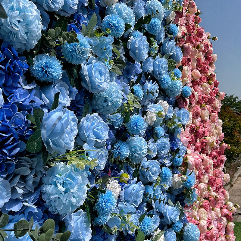 Wedding arrangement of blue and pink rose flower wall