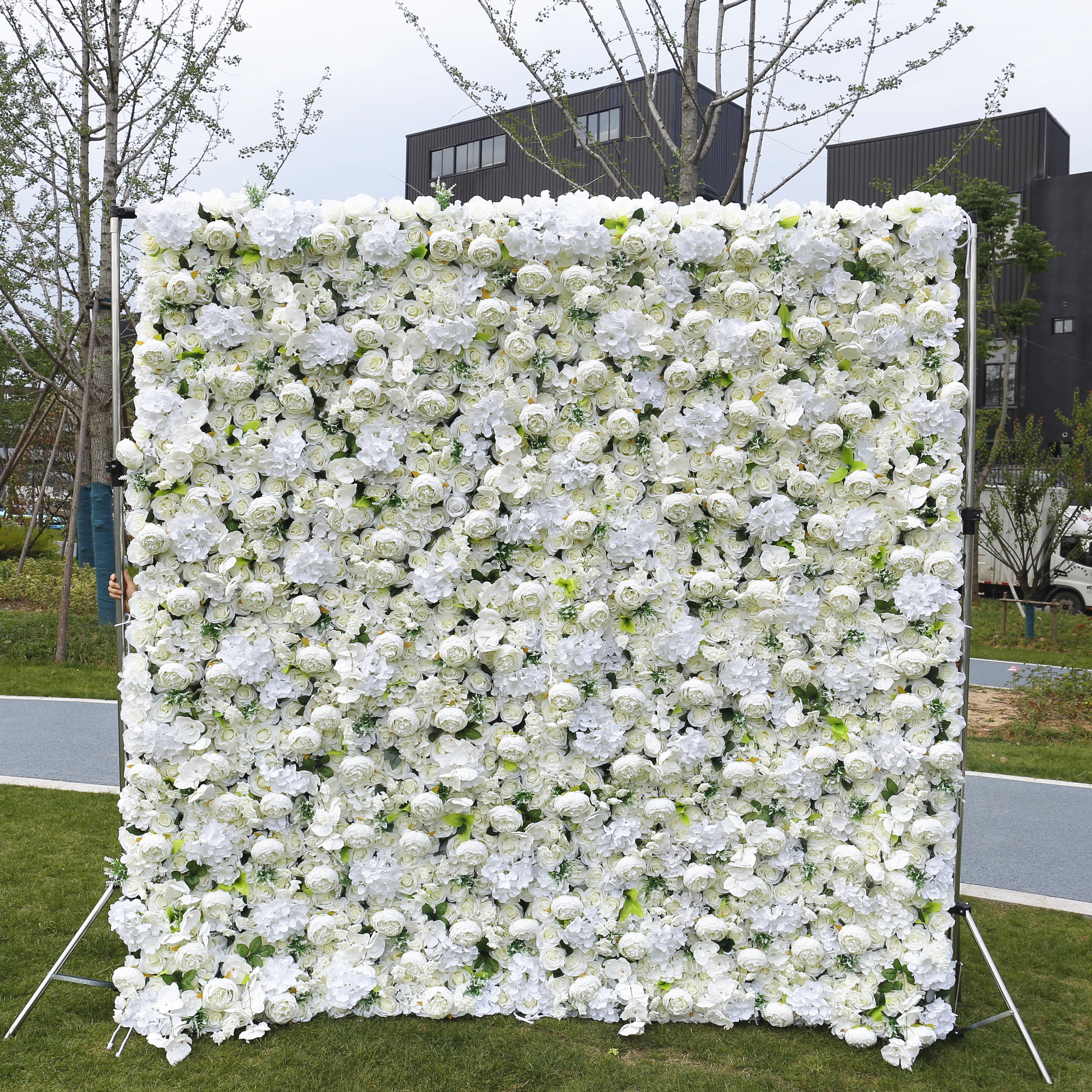 White floral wall backdrop outdoors