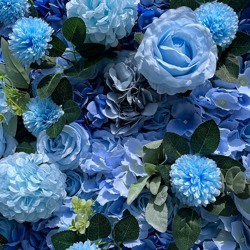 Bouquet of blue flowers with green leaves